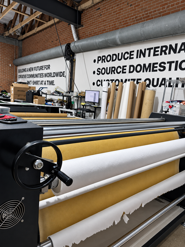 Textile roller equipment in the Arena Prints workshop